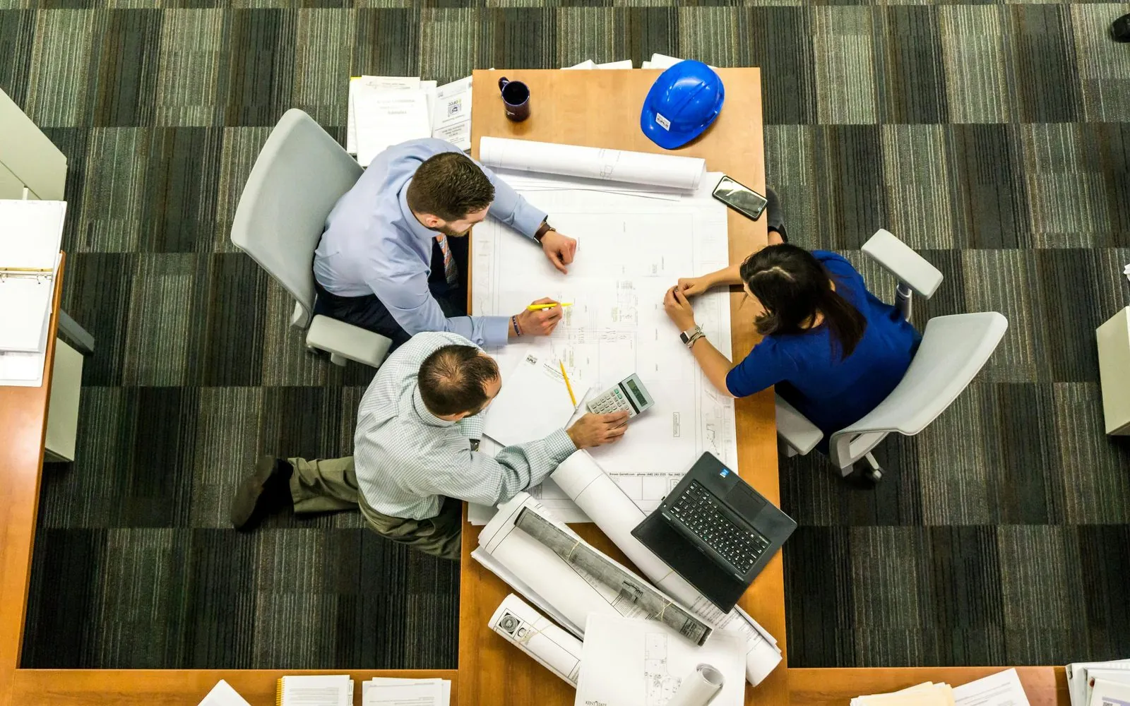 Service & Control Tower team working on layouts and contract analysis